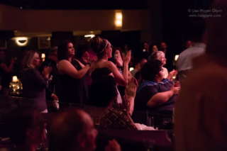 Audience members stand and applaud at Jazz Alley