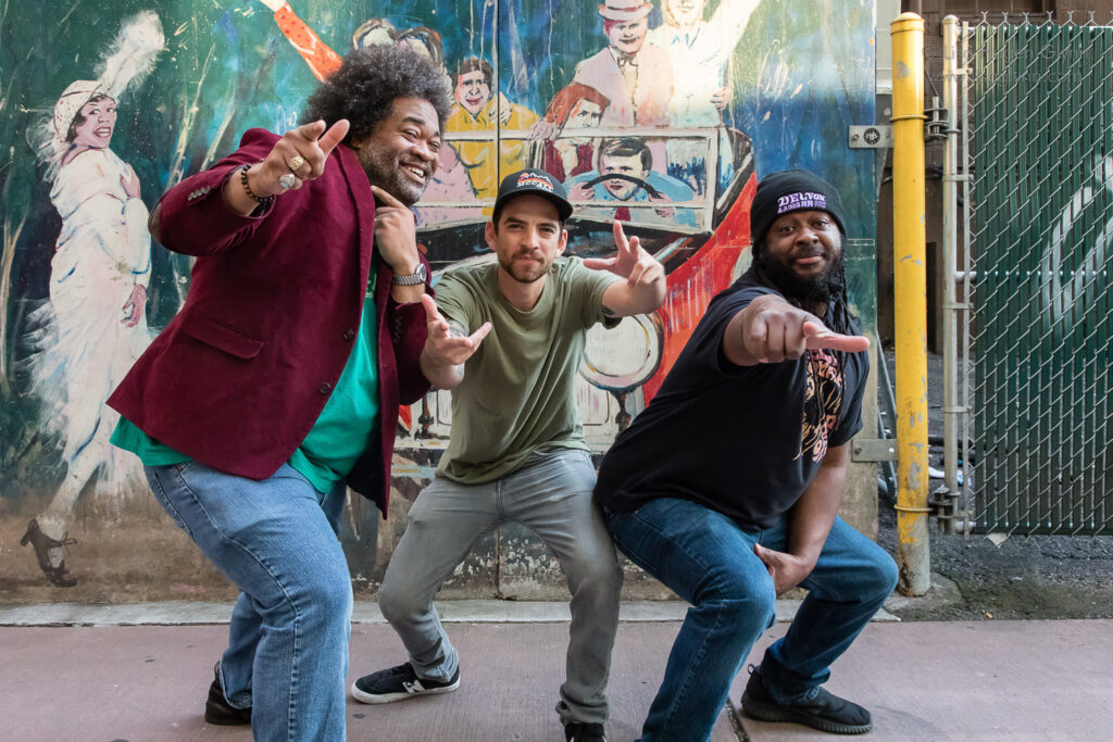 Delvon Lamarr Organ Trio poses outside Jazz Alley.