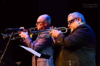 Thomas Marriott and Ray Vega play trumpet