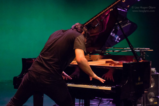 Micah Thomas plays piano at Langston Hughes