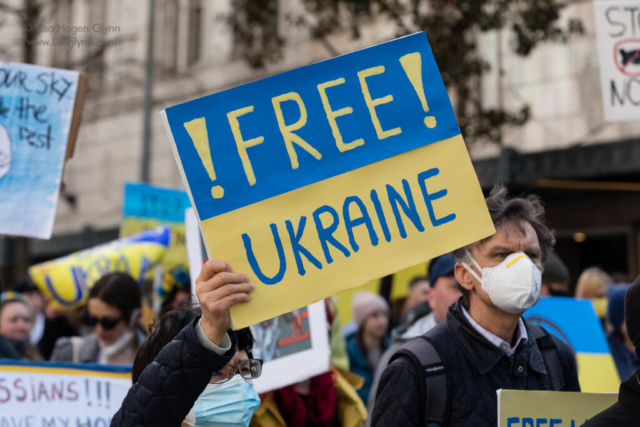 A sign reads, "Free Ukraine."