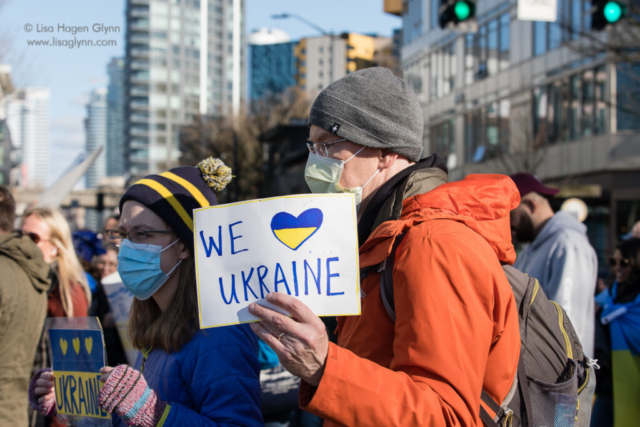 A sign reads, "We heart Ukraine"