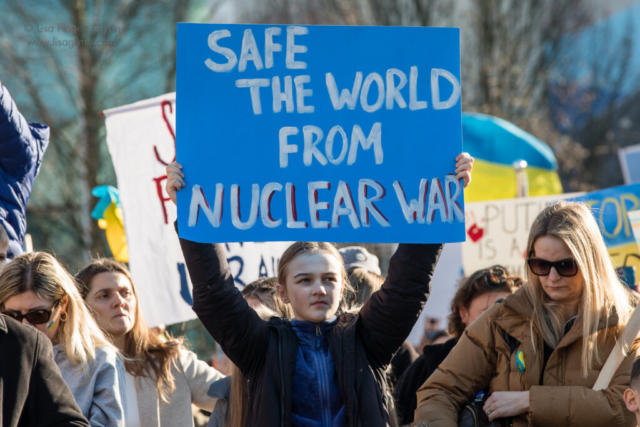 Sign reads, "Safe the world from nuclear war"