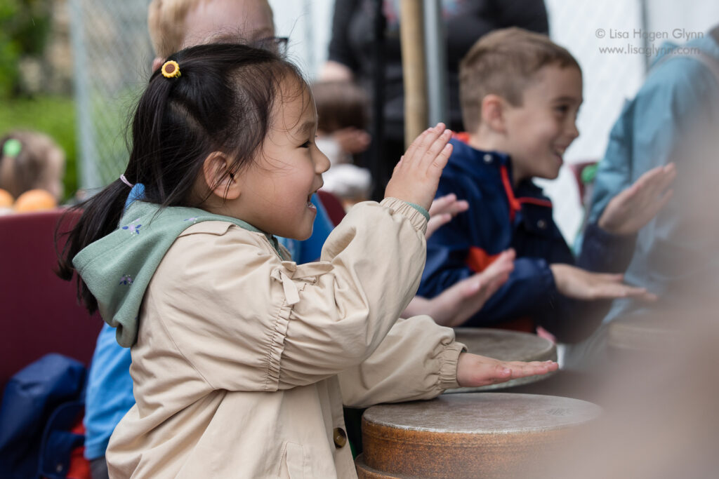Children learn to drum