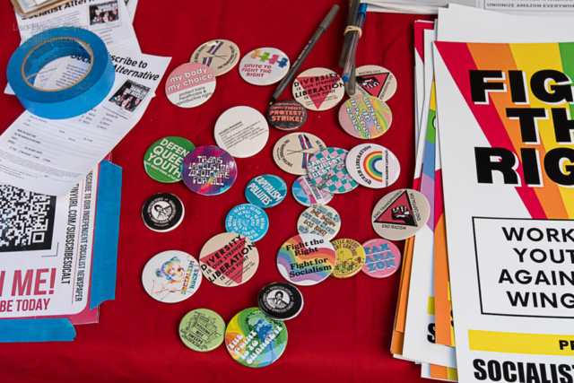 Socialist buttons at the rally.