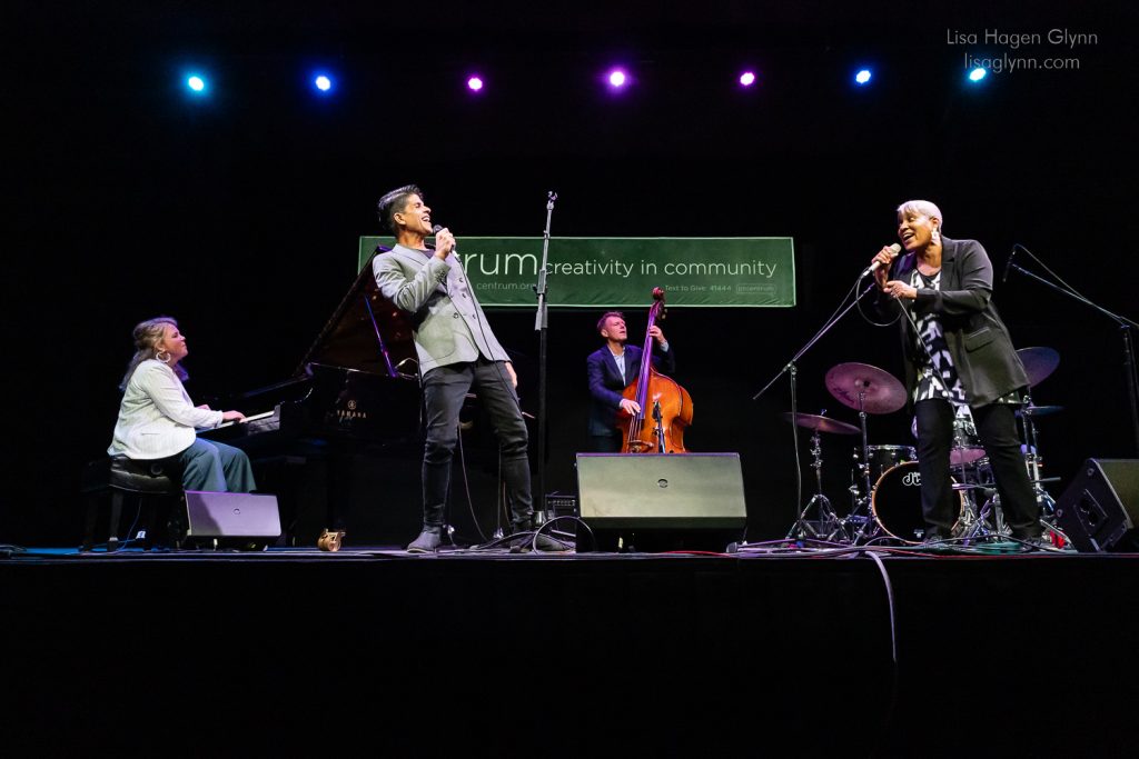 Sachal Vasandani and René Marie perform a vocal duet at the 2023 Jazz Port Townsend event, accompanied by Dawn Clement, Martin Wind, and Matt Wilson (obscured) (photo: Lisa Hagen Glynn).